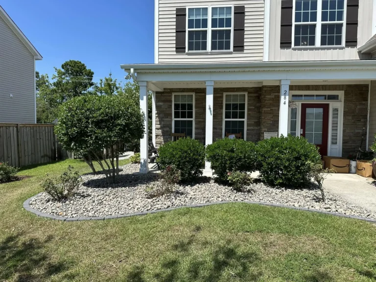 draintile, mortar in stone edging and rocked the front beds - landscaping services hampstead nc, surf city nc, and holly ridge nc