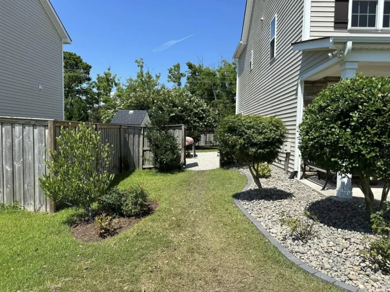 mulched, rock both sides of the house - landscaping solutions hampstead nc, surf city nc, and holly ridge nc